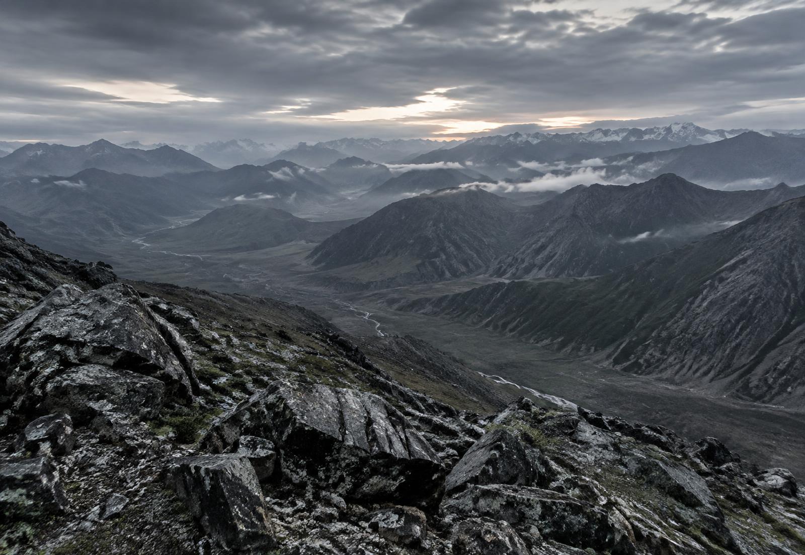 Rocky mountain terrain and layered ridgelines